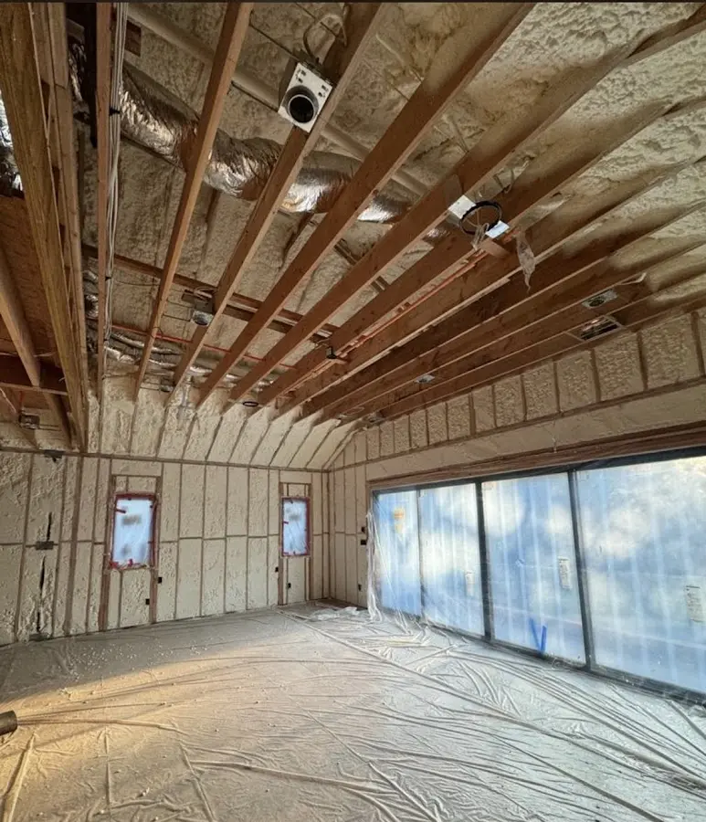 Interior walls and ceiling insulated with spray foam during new construction in Edmond